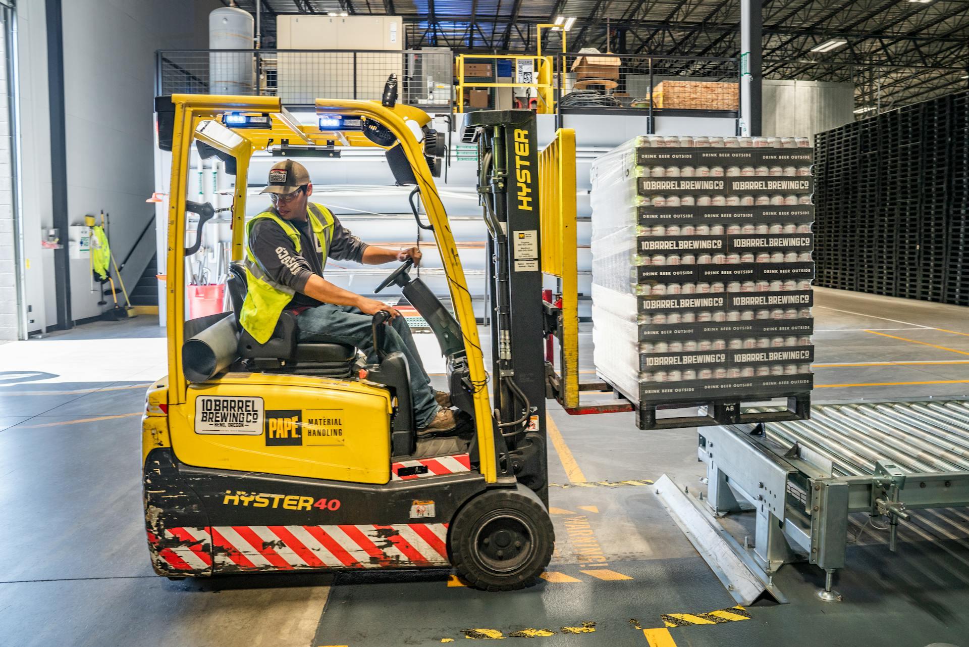 Forklift operator at a dock door